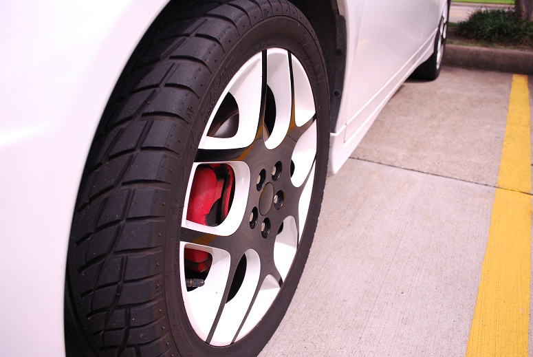 Custom painted white OEM wheels on SRT4