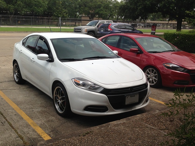 White Dodge Dart stops by to pickup some Eibach lowering springs